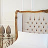 Gold Crested Upholstered Bed