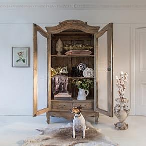 Four Ways To Style An Armoire In Your Home