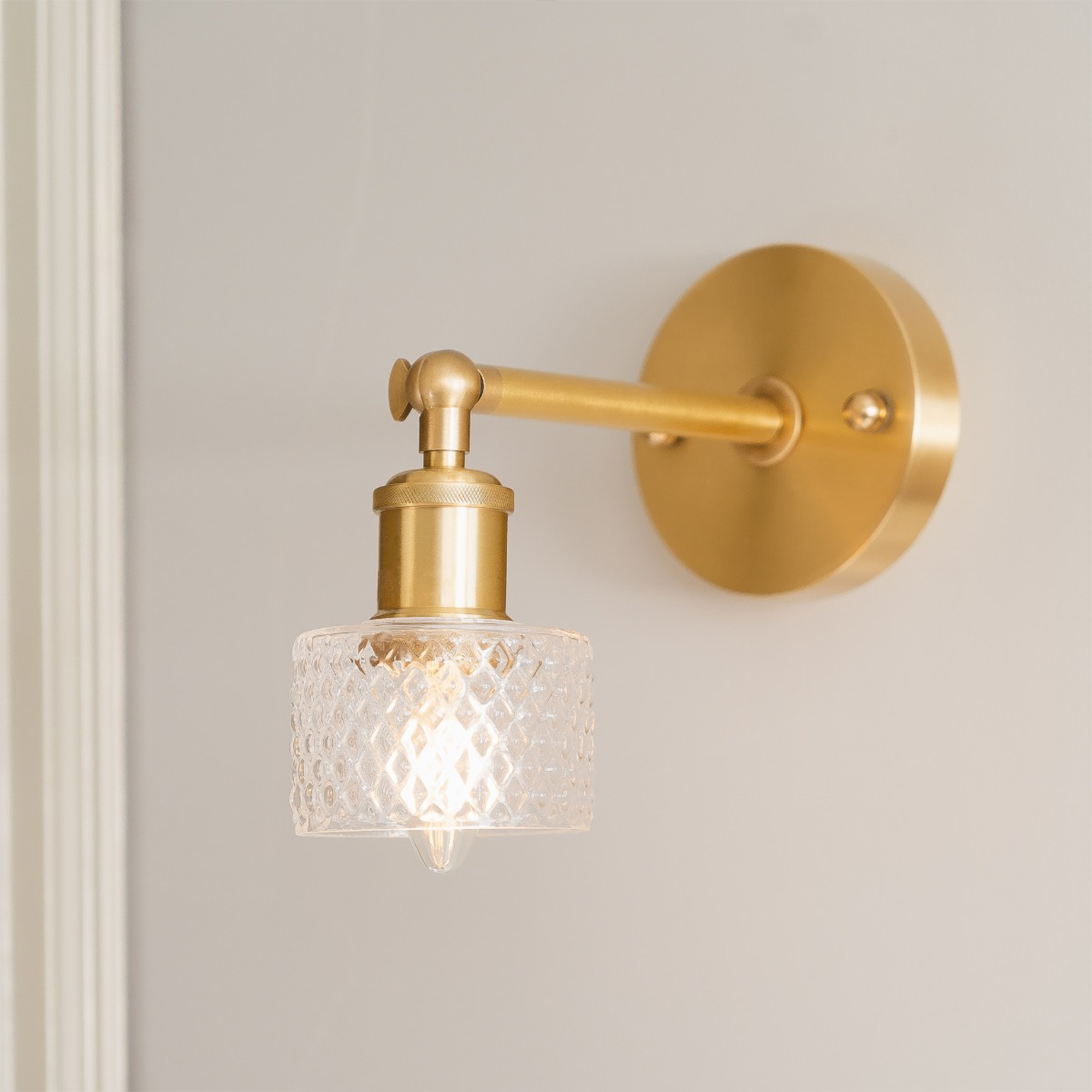 Small Clear Glass Wall Light with Adjustable Gold Arm