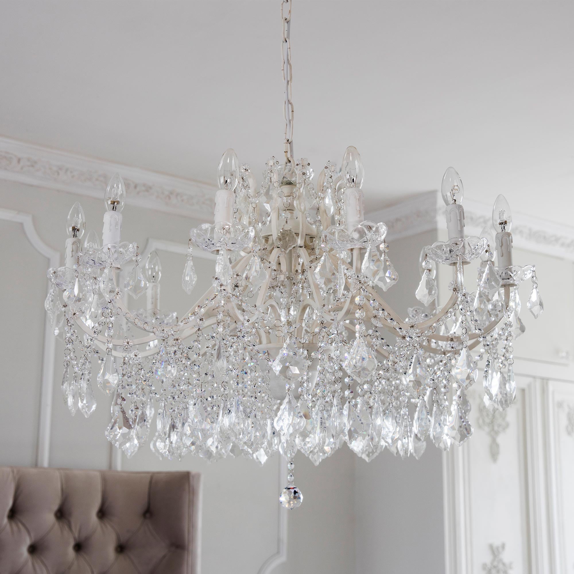 glass and white 12 arm chandelier 