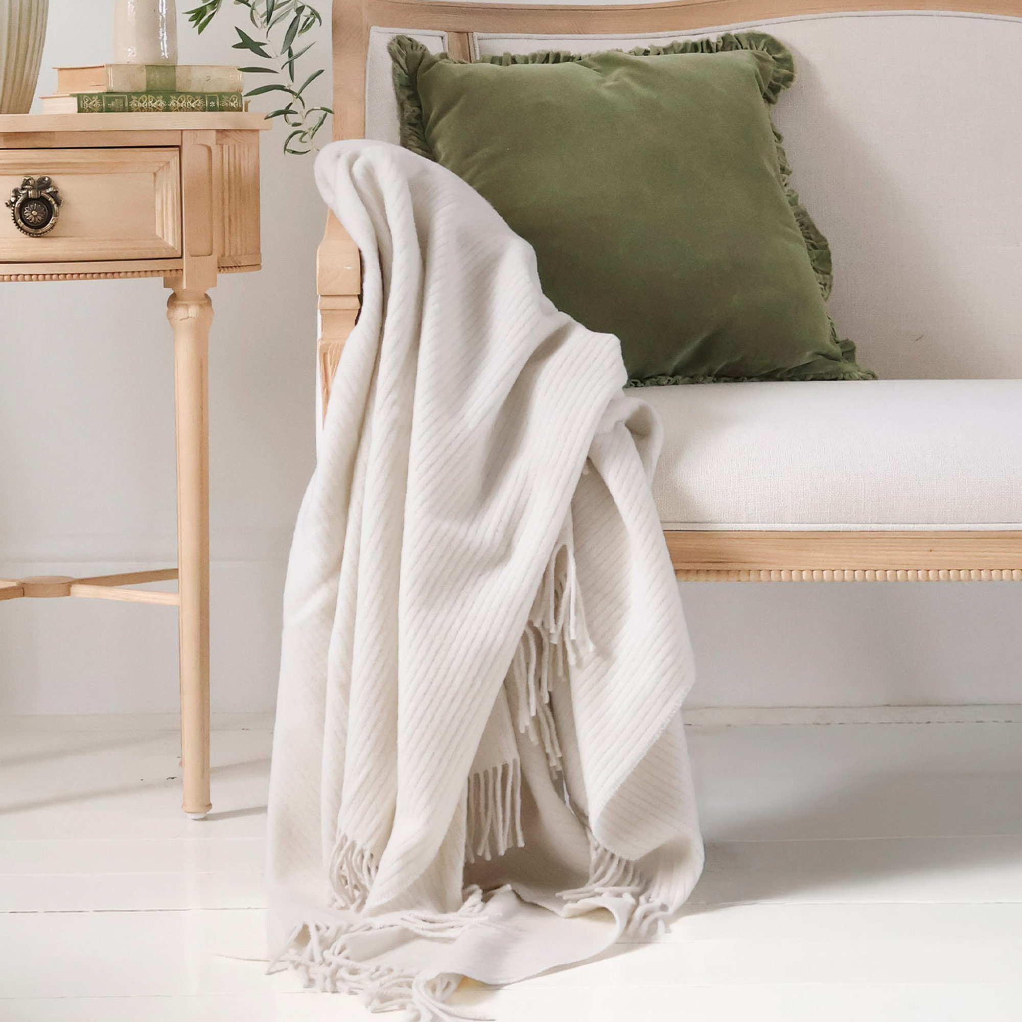 Cloud White Cashmere Throw With Olive Green Cushion On Gustavian Sofa With Gustavian Oval Bedside Table 