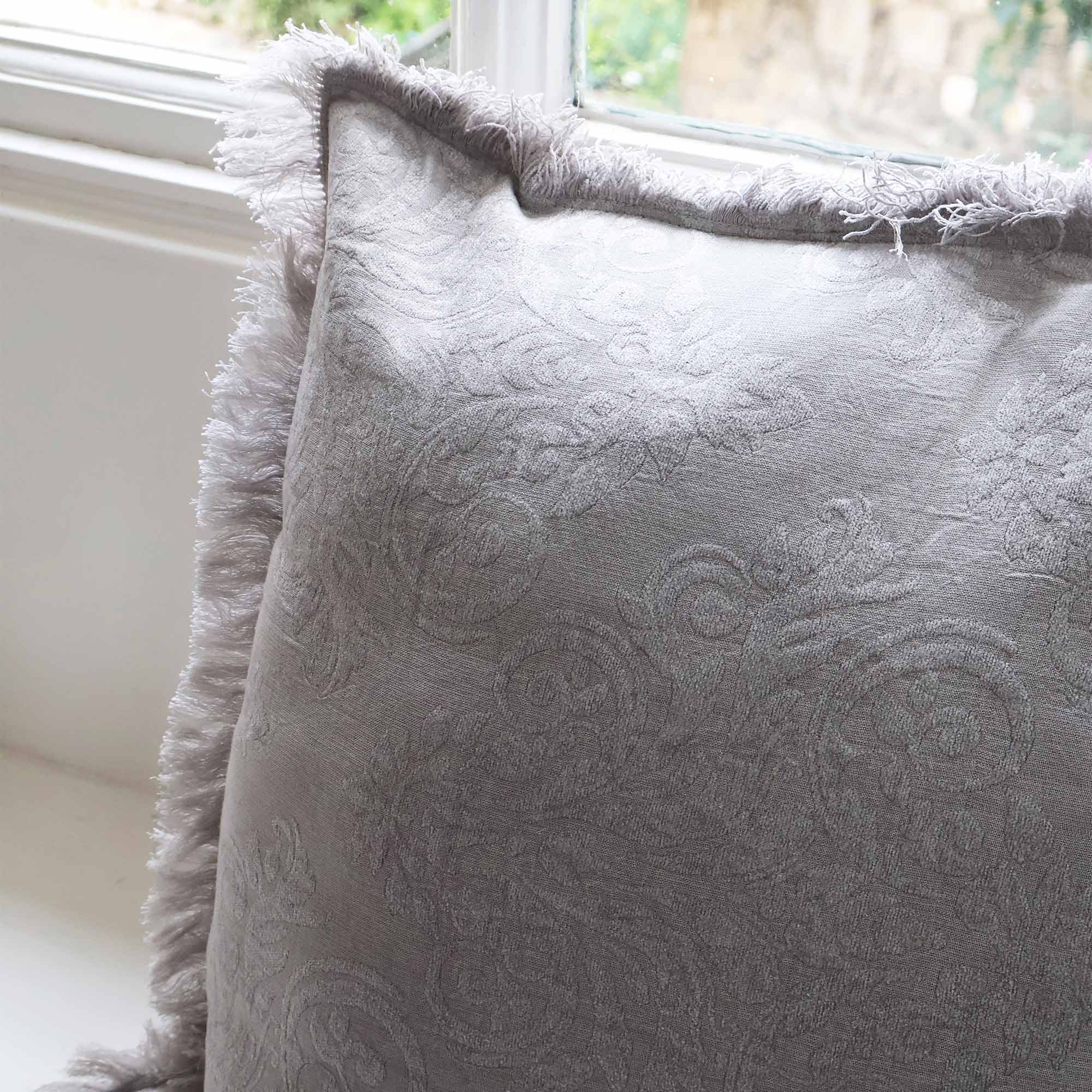 Fringed Jacquard Cushion in Light Grey