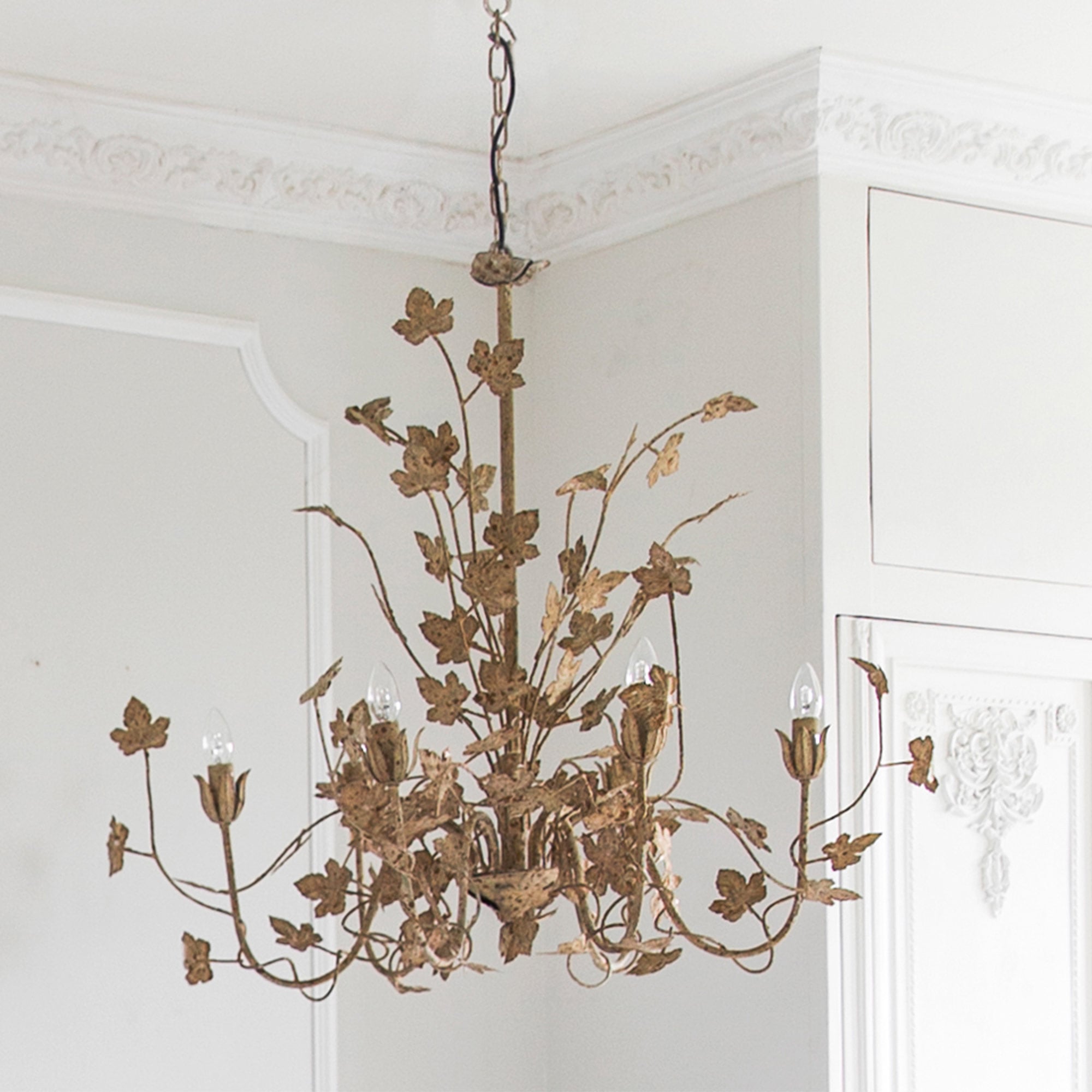 rustic metal 6 armed chandelier with leaf details 