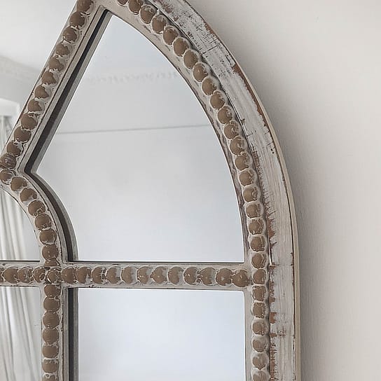 Arch Wall Mirror with Beaded Panels in a Distressed Finish Arch Wall Mirror with Beaded Panels in a Distressed Finish