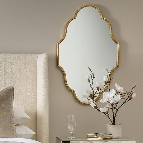 Gold Wall Mirror in a Quatrefoil Shape Gold Wall Mirror in a Quatrefoil Shape