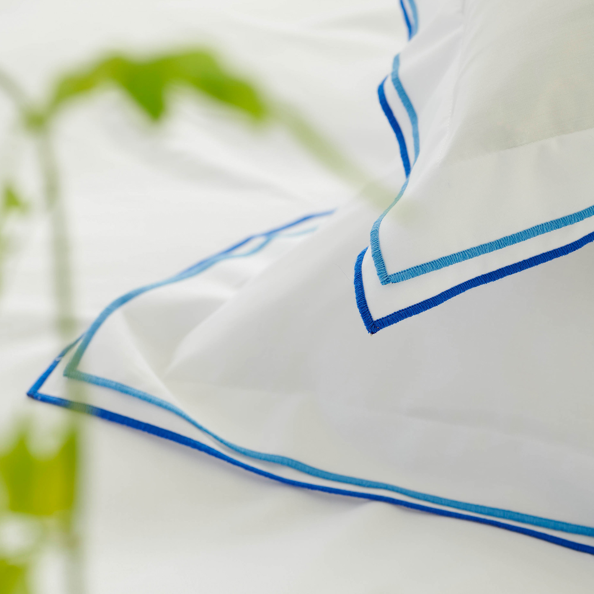 White Bed Linen Set with Blue Edge Detailing