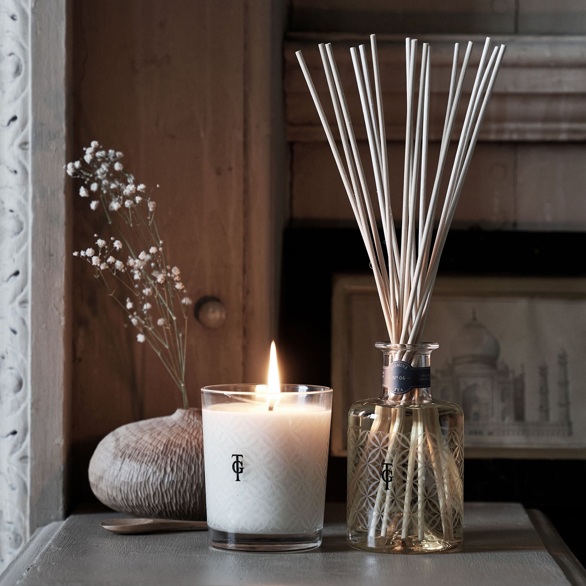 cream candle in glass jar 
