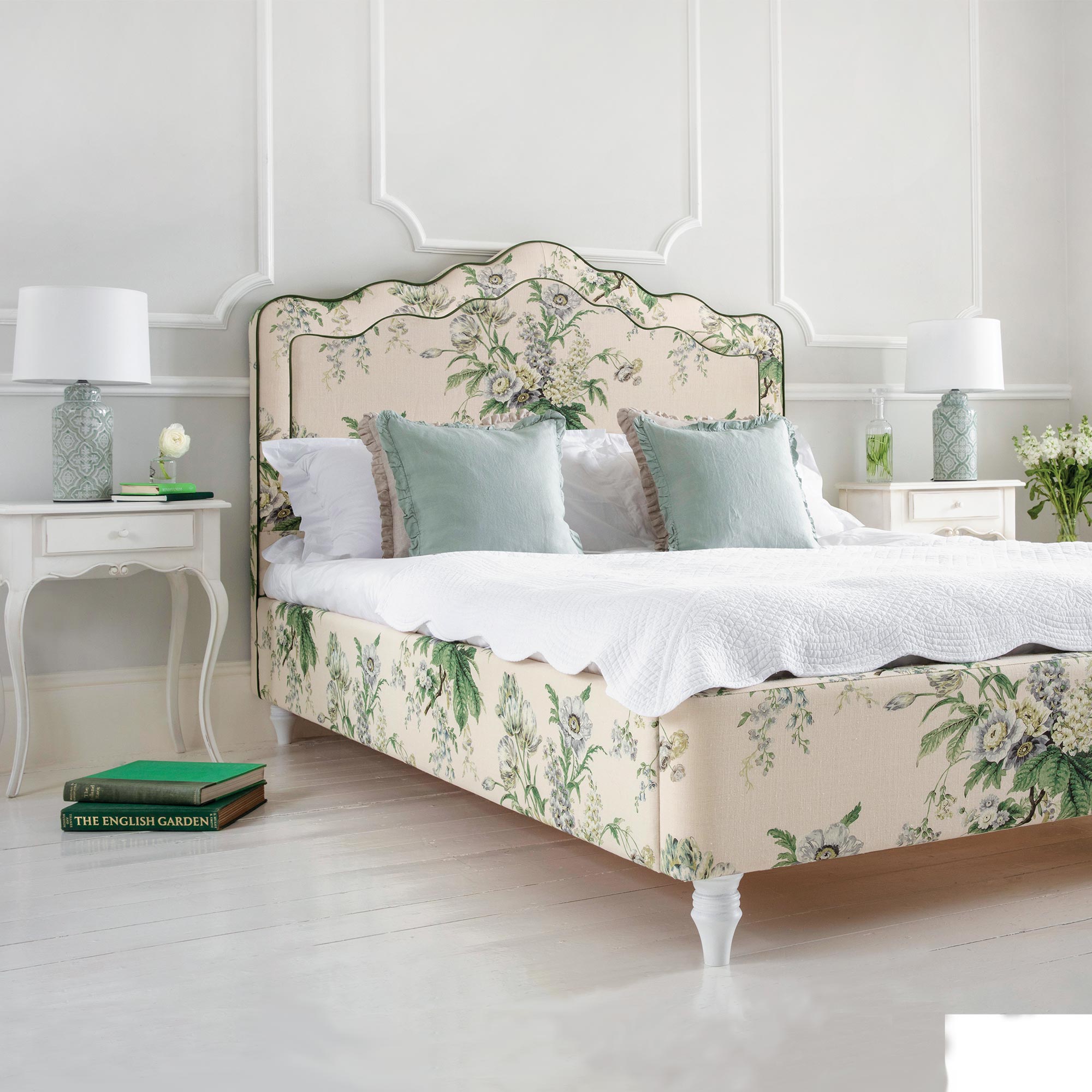 floral upholstered bed in ivory and green 