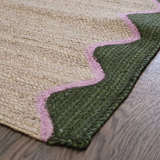 Hand-Woven Rug in Dark Olive and Lilac Pink Scallop Detailing Hand-Woven Rug in Dark Olive and Lilac Pink Scallop Detailing