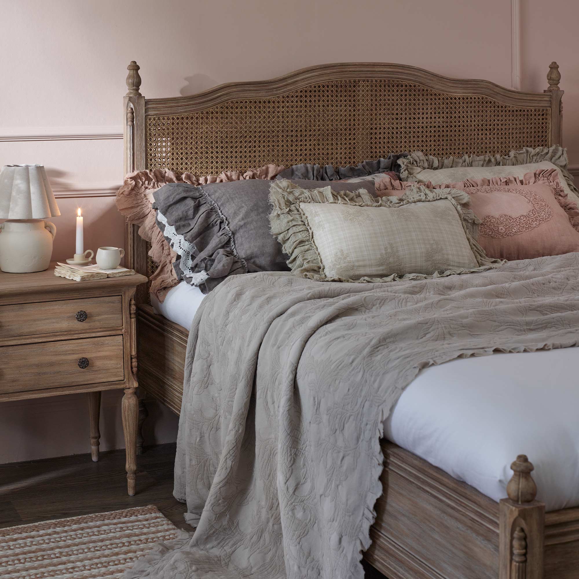 How to dress a rattan wooden bed with cushions, blankets and throws.