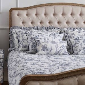 Beige Buttoned Upholstered Bed with Wooden Bed Frame and Blu Toile bedding
