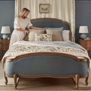 Georgia, Founder & Creative Director Styling a Blue Velvet French bed