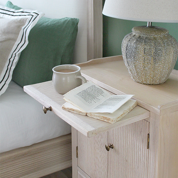 Gustavian style bedside cabinet. With a pull out shelf to pop your cup of tea or book on. 
