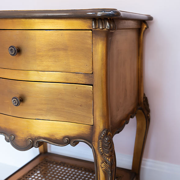 Close up shot of a Handmade Gold Gilt Luxury French Style Bedside Table with Two Drawers
